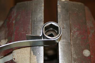 Blechstreifen herumgebogen